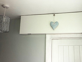 Electrics covered up with home-made box, Welsh heart with Cwtch hanging from pull-down handle